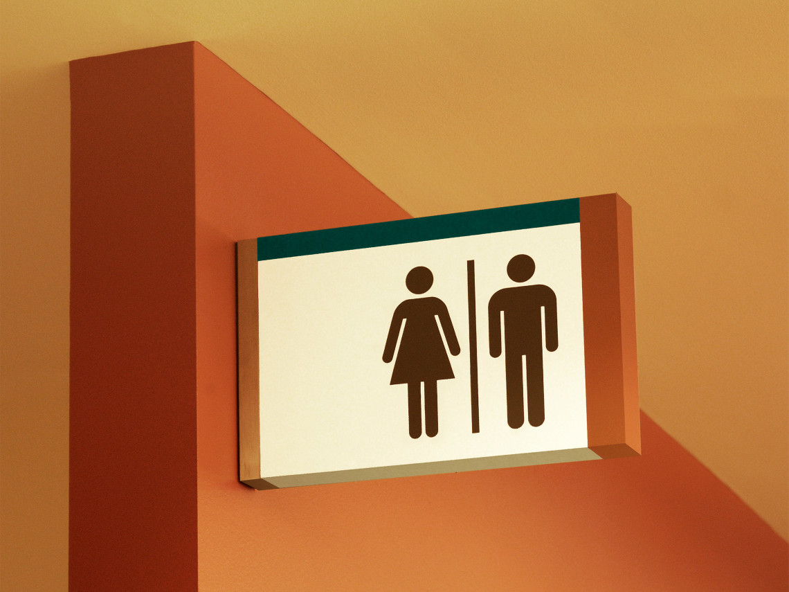 Leatherby-Libraries-7-restroom-flag-sign